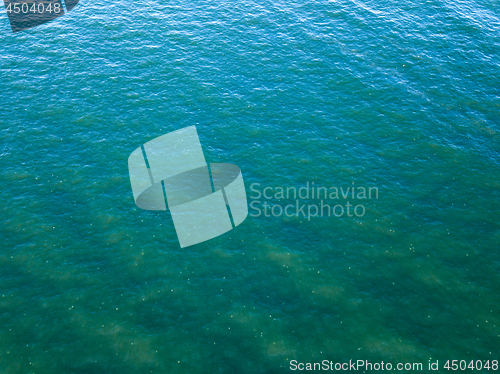 Image of Ocean surface landscape from bird\'s eye drone view. Natural sea 