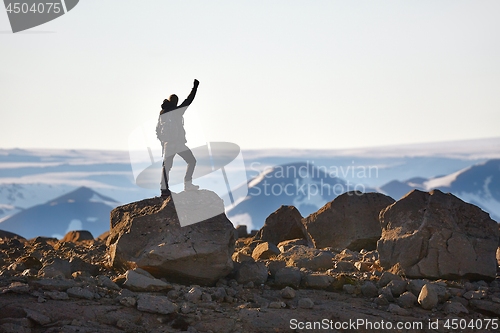 Image of Standing on a cliff