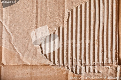 Image of Torn piece of cardboard