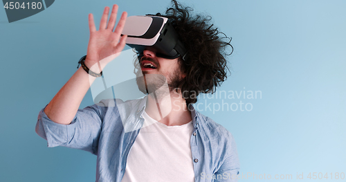 Image of man using VR headset glasses of virtual reality