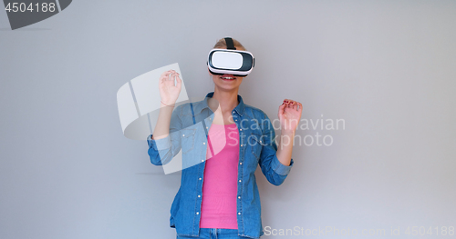 Image of girl using VR headset glasses of virtual reality