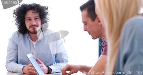 Image of Startup Business Team At A Meeting at modern office building