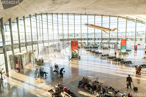 Image of People waiting for their flight at departure terminal of Valencia Airport in Manises, also known as Manises Airport