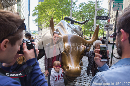 Image of The landmark Charging Bull in Lower Manhattan represents the strength and power of the American People in New York, USA, on 18th of May, 2018.