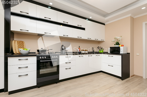 Image of Modern black and white kitchen