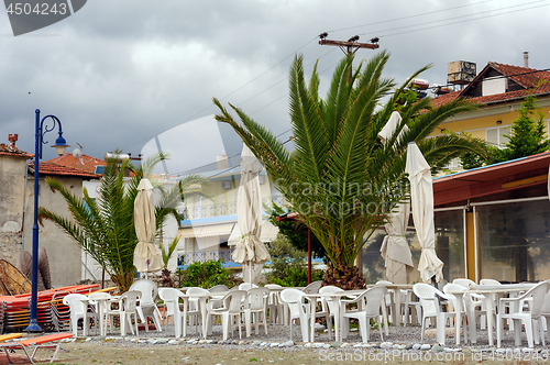 Image of Empty outdoor cafe at the beach in Leptokaria, Macedonia, Greece