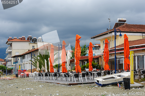 Image of Empty outdoor cafe at the beach in Leptokaria, Macedonia, Greece