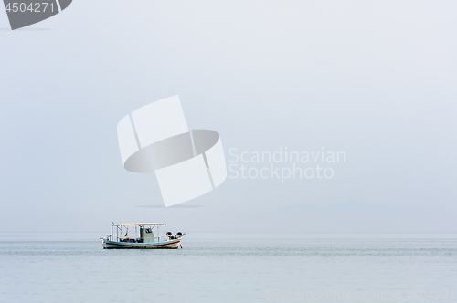Image of Two small fishing boat at sea surface