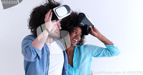 Image of multiethnic couple getting experience using VR headset glasses