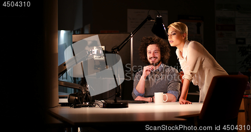 Image of young designers in the night office