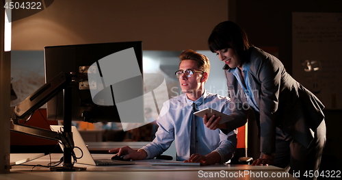 Image of young designers in the night office