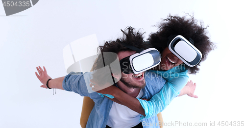 Image of multiethnic couple getting experience using VR headset glasses