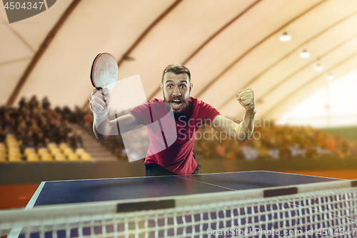 Image of The table tennis player celebrating victory