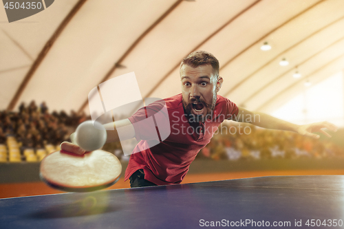 Image of The table tennis player serving