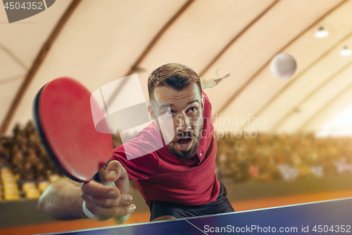 Image of The table tennis player serving