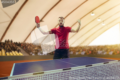 Image of The table tennis player celebrating victory