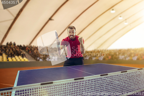 Image of The table tennis player celebrating victory