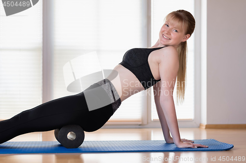 Image of Girl with fascia roll