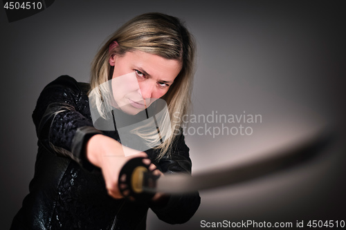 Image of Female fighter with sword