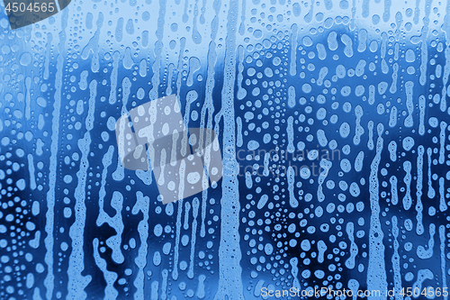 Image of Soap foam pattern on glass