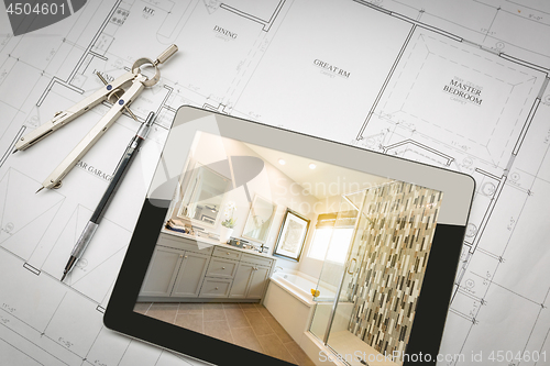 Image of Computer Tablet with Master Bathroom Design Over House Plans, Pe