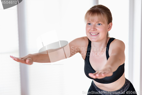 Image of Girl doing squat exercises