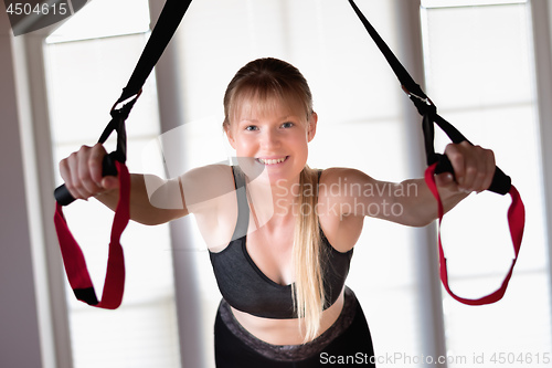 Image of Girl in sling training