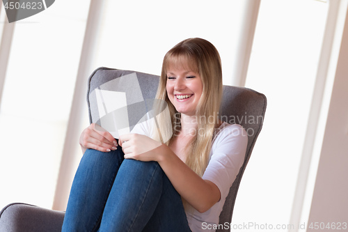 Image of Woman holding photo