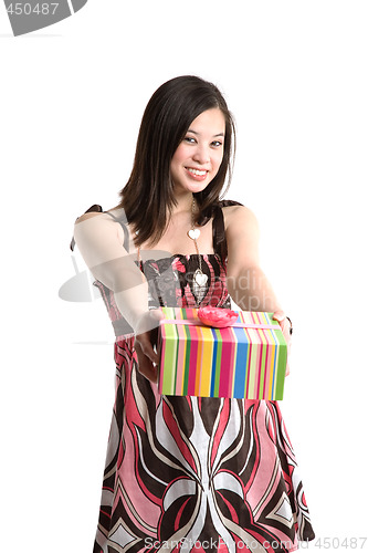 Image of Asian woman giving gift