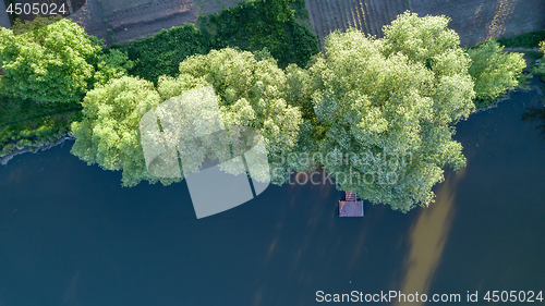 Image of Aerial view of lakes, bridge and green forests district