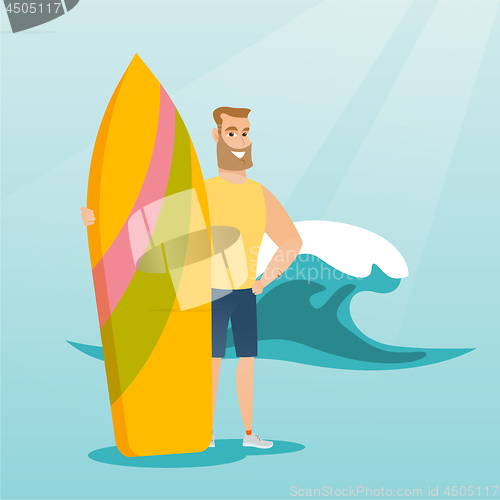 Image of Young caucasian surfer holding a surfboard.