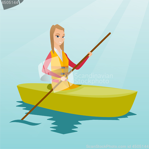 Image of Young caucasian woman travelling by kayak.