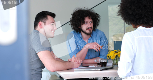 Image of Multiethnic startup business team on meeting