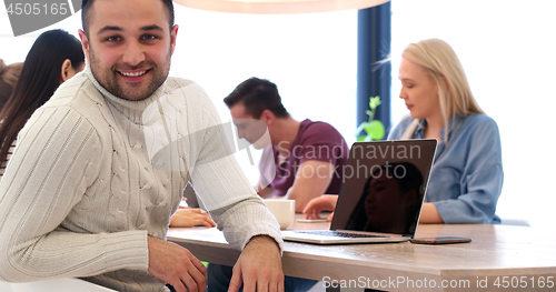 Image of Startup Business Team At A Meeting at modern office building