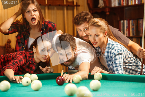 Image of Close-up shot of a man playing billiard