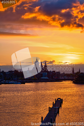 Image of Amsterdam cityscape skyline with Church of Saint Nicholas on su