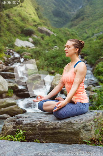 Image of Woman in Padmasana outdoors