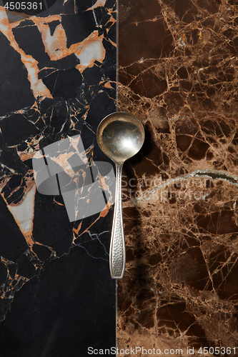 Image of spoon on a marble background