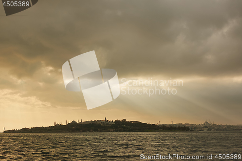 Image of Light of sunbeam through clouds to the sea