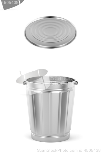 Image of Metal trash can with lid