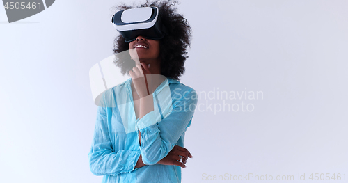 Image of black girl using VR headset glasses of virtual reality