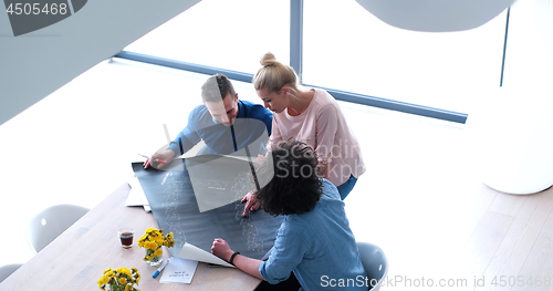 Image of Startup Business Team At A Meeting at modern office building