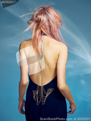 Image of Close-up indoor portrait of lovely girl with blonde hair. Studio shot of graceful young woman with short haircut