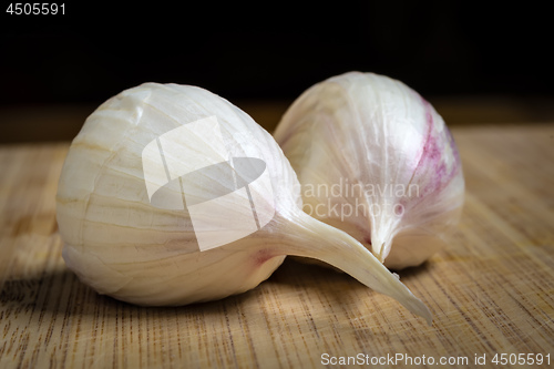 Image of Closeup of two fresh garlic clove