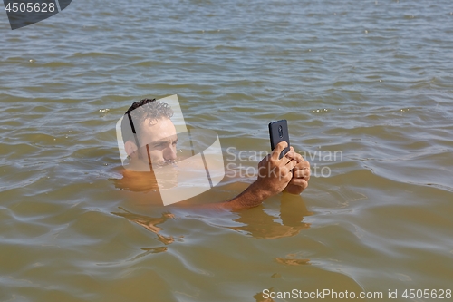 Image of Smartphone at the beach