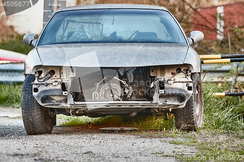 Image of Car Wreck with missing parts