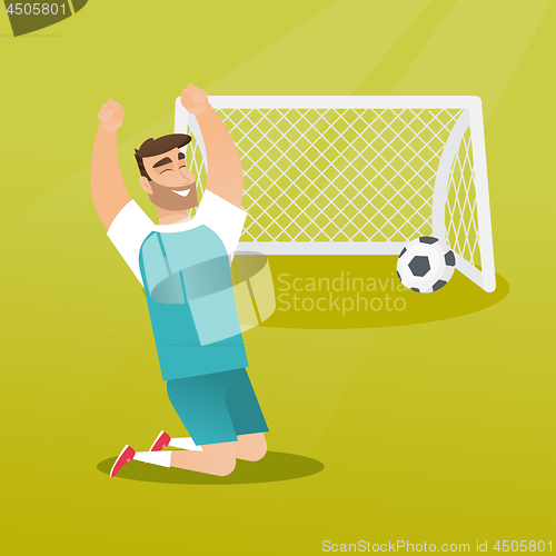 Image of Young caucasian soccer player celebrating a goal.