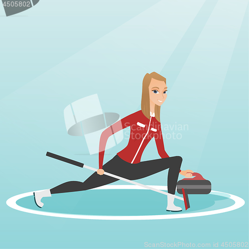 Image of Sportswoman playing curling on a skating rink.