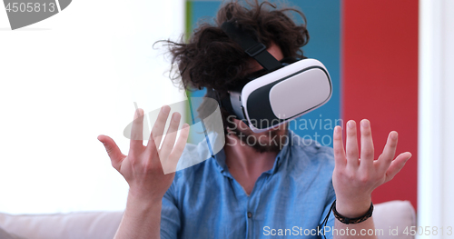 Image of man using VR-headset glasses of virtual reality