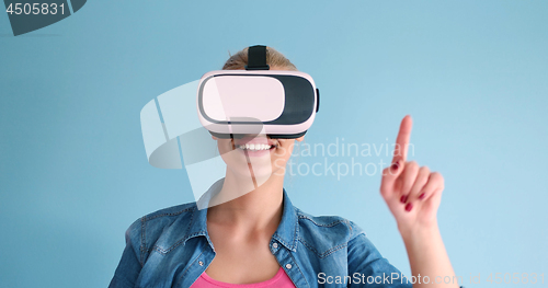 Image of woman using VR headset glasses of virtual reality